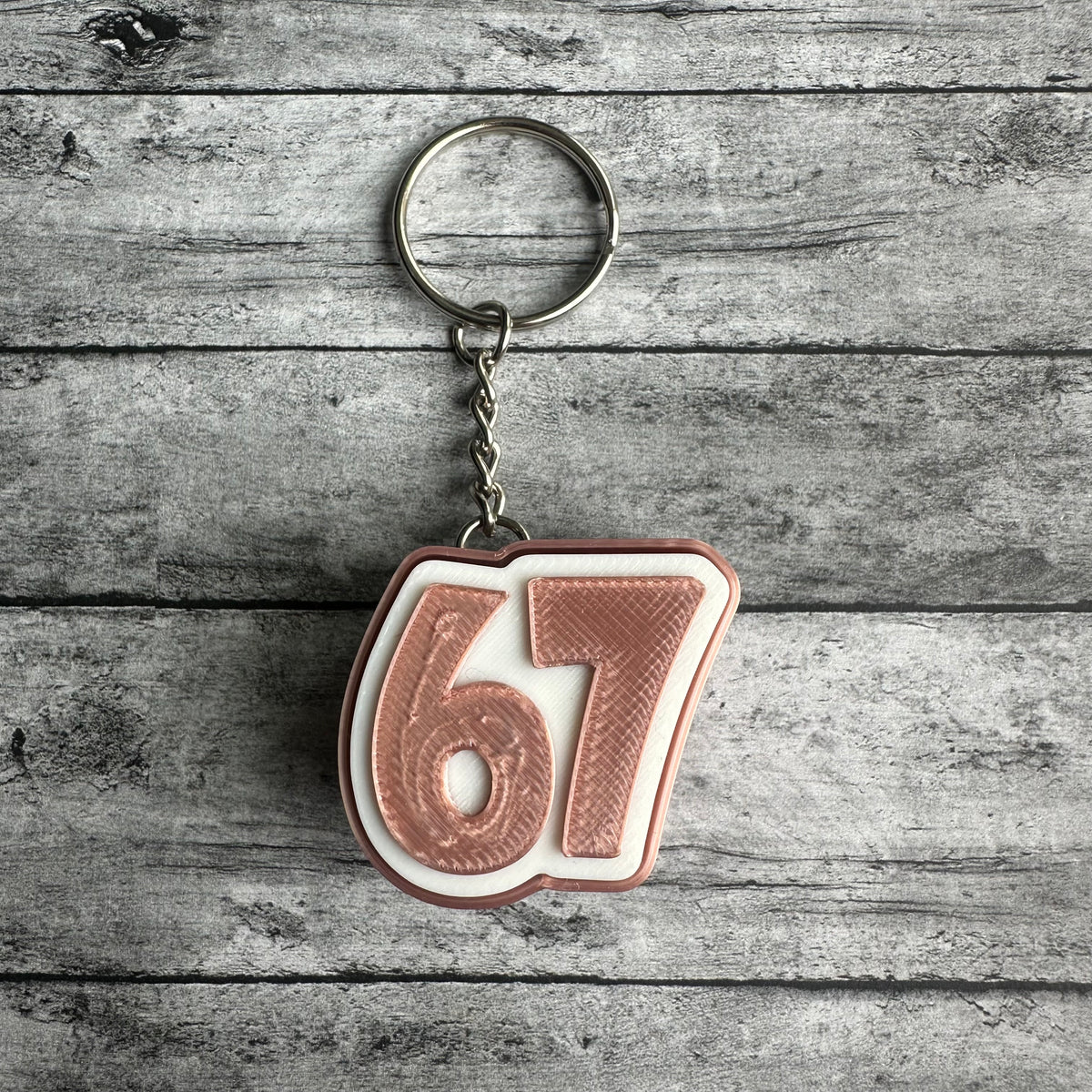 67 Keychain Clicker Rose Gold