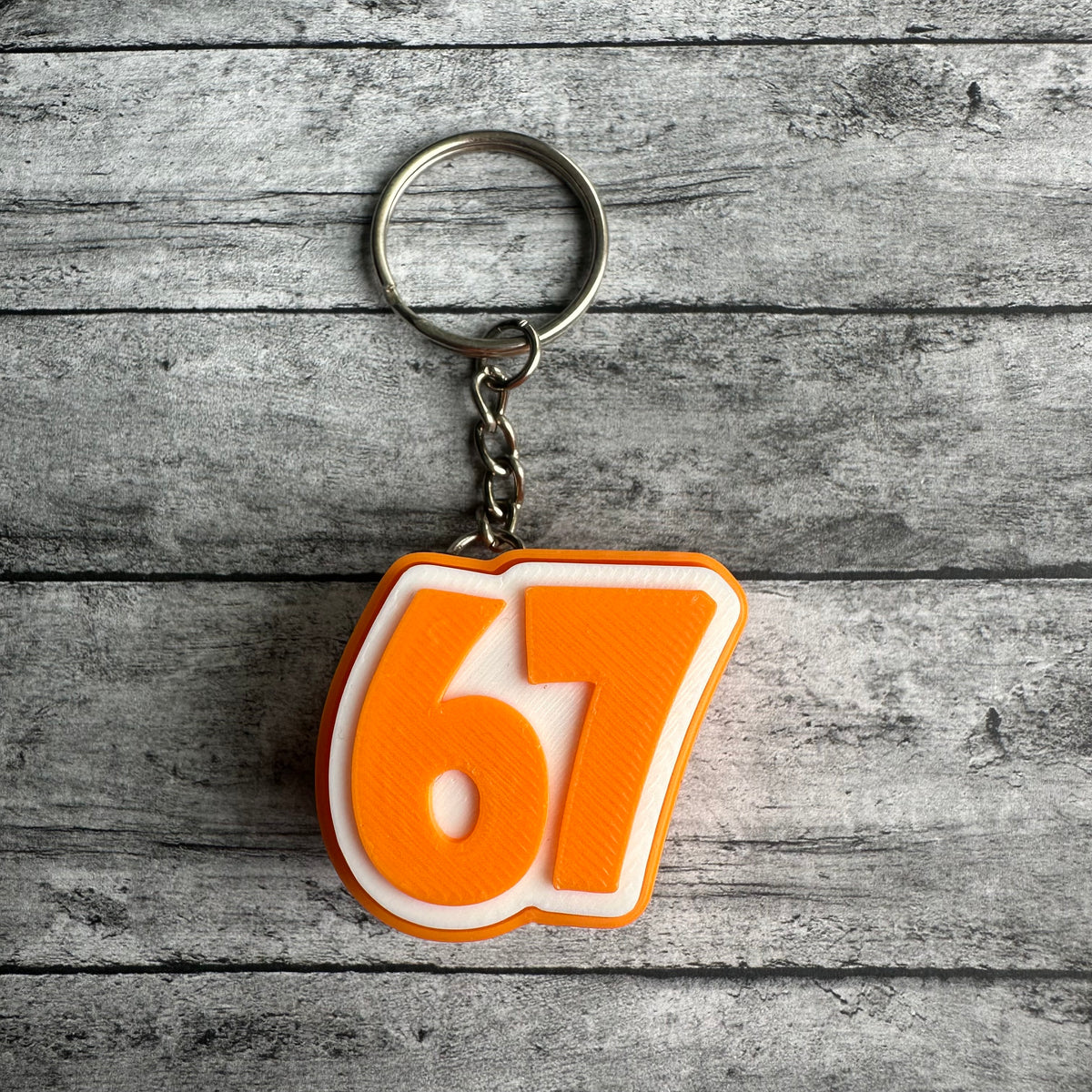 67 Keychain Clicker Orange